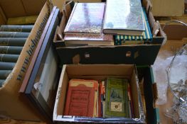 Various maps, books and two pictures.