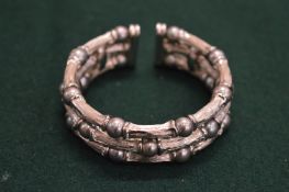 A decorative bangle.