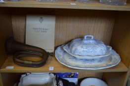 Blue and white vegetable dish with cover and similar plate, a copper bugle and the Princess Mary's