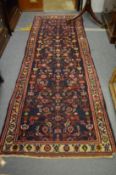A Persian design runner, 285cm x 94cm.