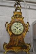 A good French ormolu and painted mantel clock.