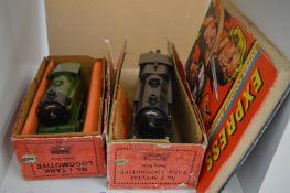 Two Hornby locomotive tanks, boxed and a children's annual.