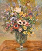 Marcel Dyf (1899-1985), a still life of colourful flowers in a glass vase, oil on canvas, signed,