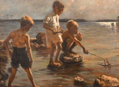 G. Kelly (20th Century), young boys playing with a toy yacht on a rocky coastline, oil on canvas