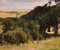 Frank Lewis Emanuel (1866-1948), view over a wooded area towards the sea, oil on panel, signed,