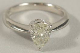 A CERTIFICATED PLATINUM SOLITAIRE RING set with a 1.04ct pear shaped diamond. Cert. No.