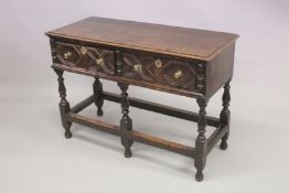 A 19TH CENTURY OAK DRESSER BASE OF SMALL SIZE, with a pair of moulded, panelled drawers on