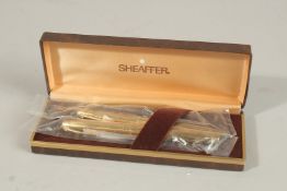 A SHEAFFER PEN SET.
