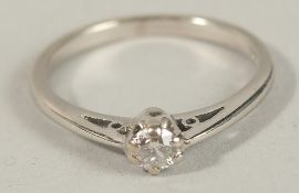 A 9CT WHITE GOLD RBC DIAMOND SOLITAIRE RING, boxed. Diamond 0.15ct.