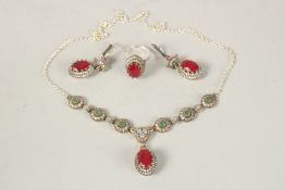 A SILVER AND GILT CHALCEDONY NECKLACE, EARRINGS AND RING SET.