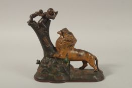 KYSER & REX CO. FRANKFORD, PENNSYLVANIA, CIRCA. 1880. A LION AND TWO MONKEYS, CAST IRON, PAINTED