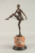 AFTER D. ALONZO A BRONZE HOOP DANCER. Signed, on a marble base. 50cms high.