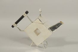 A CHRISTOPHER DRESSER DESIGN SILVER PLATED TEAPOT, square with a hole.
