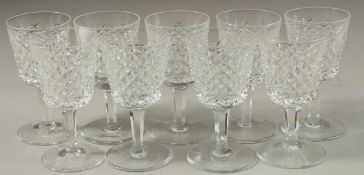 A SET OF NINE SMALL WINE GLASSES. 11cms high.