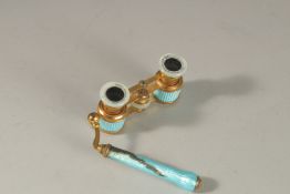 A PAIR OF FLAMMARION SILVER GILDED AND ENAMEL OPERA GLASSES by HENRY BIRKS & SON. Handle (AF).