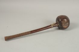 A SOUTH SEAS THROWING CLUB with etched handle. 40cms long.