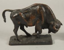 A 19TH CENTURY FRENCH BRONZE BISON on a rectangular base. 18cms long x 12cms high.