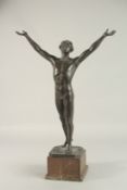 OTTO SCHMIDT-HOFER (GERMAN) 1873-1925 A GOOD BRONZE OF A NUDE MAN, standing arm upright. Signed.