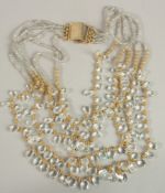 A SILVER GILT AND CRYSTAL NECKLACE.