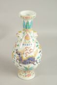 A CHINESE POLYCHROME KYLIN VASE. 36cms high.