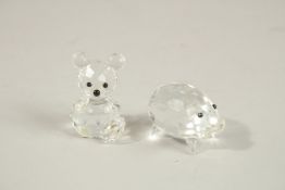A SWAROVSKI PIG AND BEAR,