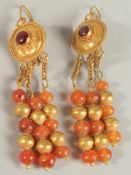 A PAIR OF 24CT GOLD DROP EARRINGS.