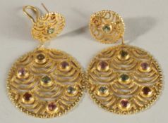 A PAIR OF 18CT GOLD LALAOUNIS CIRCULAR EARRINGS set with coloured stones. 3.5cms diameter.