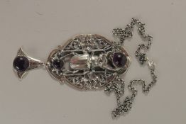 A SILVER AMETHYST SCARAB NECKLACE.