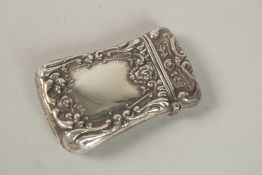 A SILVER EMBOSSED VESTA CASE. 5.5cms.