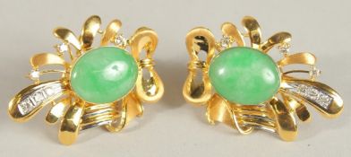 A GOOD PAIR OF 18CT GOLD, DIAMOND AND CABOCHON GREEN STONE EAR CLIPS.