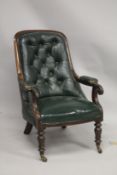 A WILLIAM IV MAHOGANY AND GREEN LEATHER BUTTON UPHOLSTERED LIBRARY ARMCHAIR, with turned and