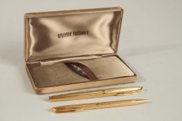 A PAIR OF WATERMAN PENS, fountain pen and pen in a gold coloured box.