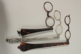 THREE HANDHELD LORGNETTES.