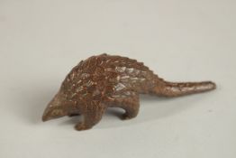A BRONZE OKIMONO OF A PANGOLIN.