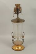 AN ETCHED GLASS AND GILT METAL LAMP. 56cms high.