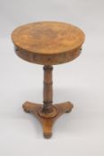 A GOOD EARLY 19TH CENTURY WALNUT DRUM TABLE, the circular top supported on a turned and carved
