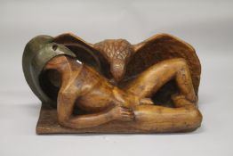 A LARGE MODERN CARVED WOOD GLADIATOR AND EAGLE. 107cms long x 56cms high.