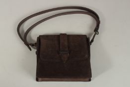 A CHANEL BROWN SUEDE BAG, No. 5459210.