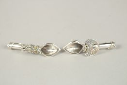 A PAIR OF SILVER OWL POSY HOLDER BROOCHES.