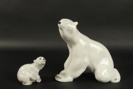 LOMONOSOV, ST. PETERSBURG, RUSSIA. A LARGE POTTERY SEATED POLAR BEAR, printed mark, 27cms long x