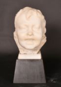 Late 19th Century Continental School, a head study of a laughing child, alabaster, on a wooden base,