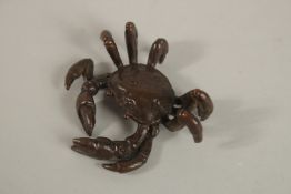 A SMALL BRONZE CRAB.