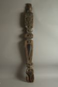 AN ELIZABETHAN SCOTTISH CARVED WOOD POST with thistles etc. 134xms long x 14cms wide.