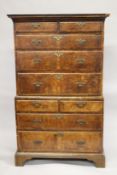 AN 18TH CENTURY WALNUT CHEST ON CHEST, with two short and three long graduated drawers to the top