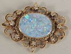 A DIAMOND AND OPAL BROOCH.