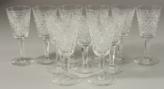 A SET OF TWELVE SMALL WINE GLASSES. 13cms high.