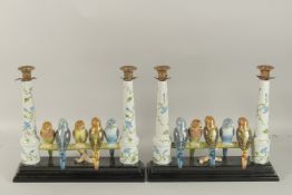 A PAIR OF UNUSUAL CANDELABRA MODELLED AS BUDGIES ON A BRANCH.