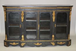A GOOD VICTORIAN EBONISED AND ORMOLU MOUNTED BREAKFRONT CREDENZA, with four glazed doors, good
