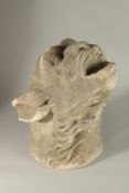 AN EARLY FRENCH CARVED MARBLE WEATHERED GARGOYLE. 41cms high.