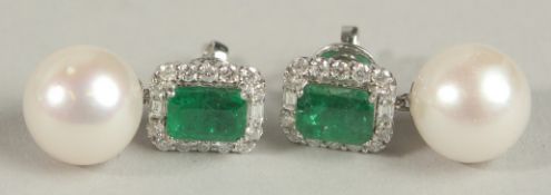 A PAIR OF 18CT WHITE GOLD PEARL, EMERALD AND DIAMOND DROPLET EARRINGS, boxed. Emerald-cut emeralds